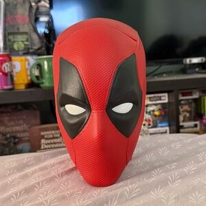 Deadpool and Wolverine head popcorn bucket